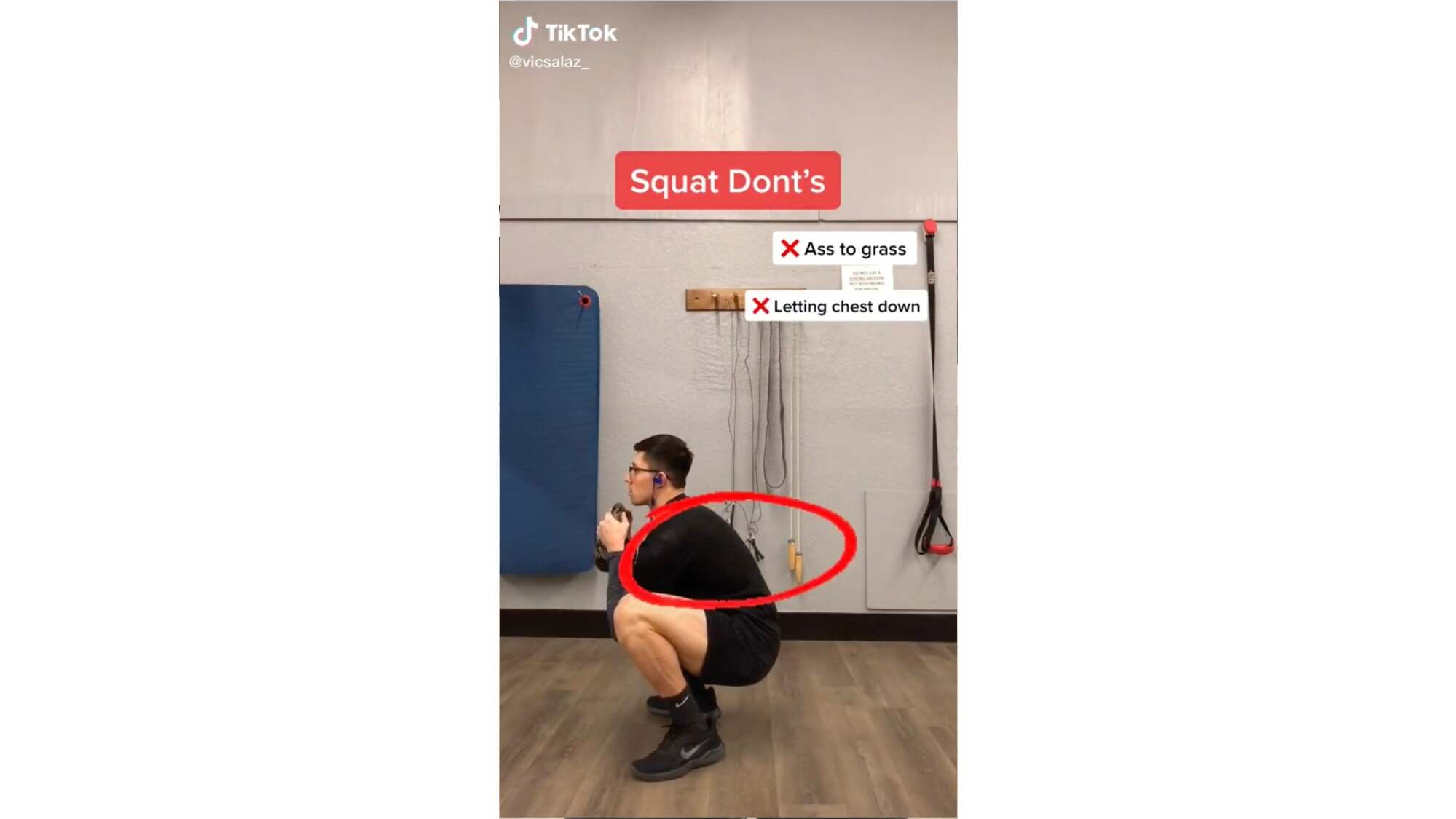 man squatting with a circle around his back and an X next to the words "ass to grass"