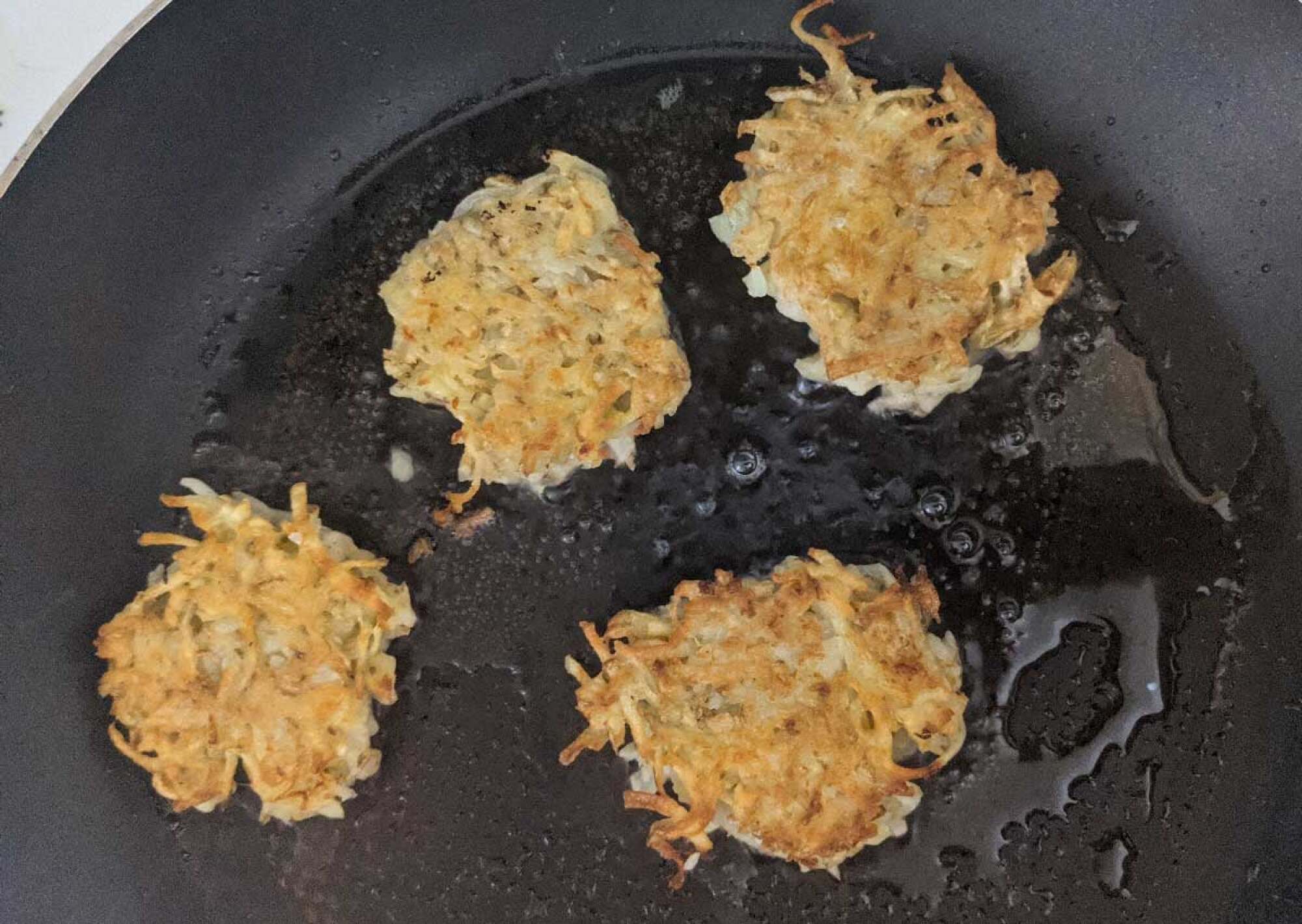 Latkes in oil. 