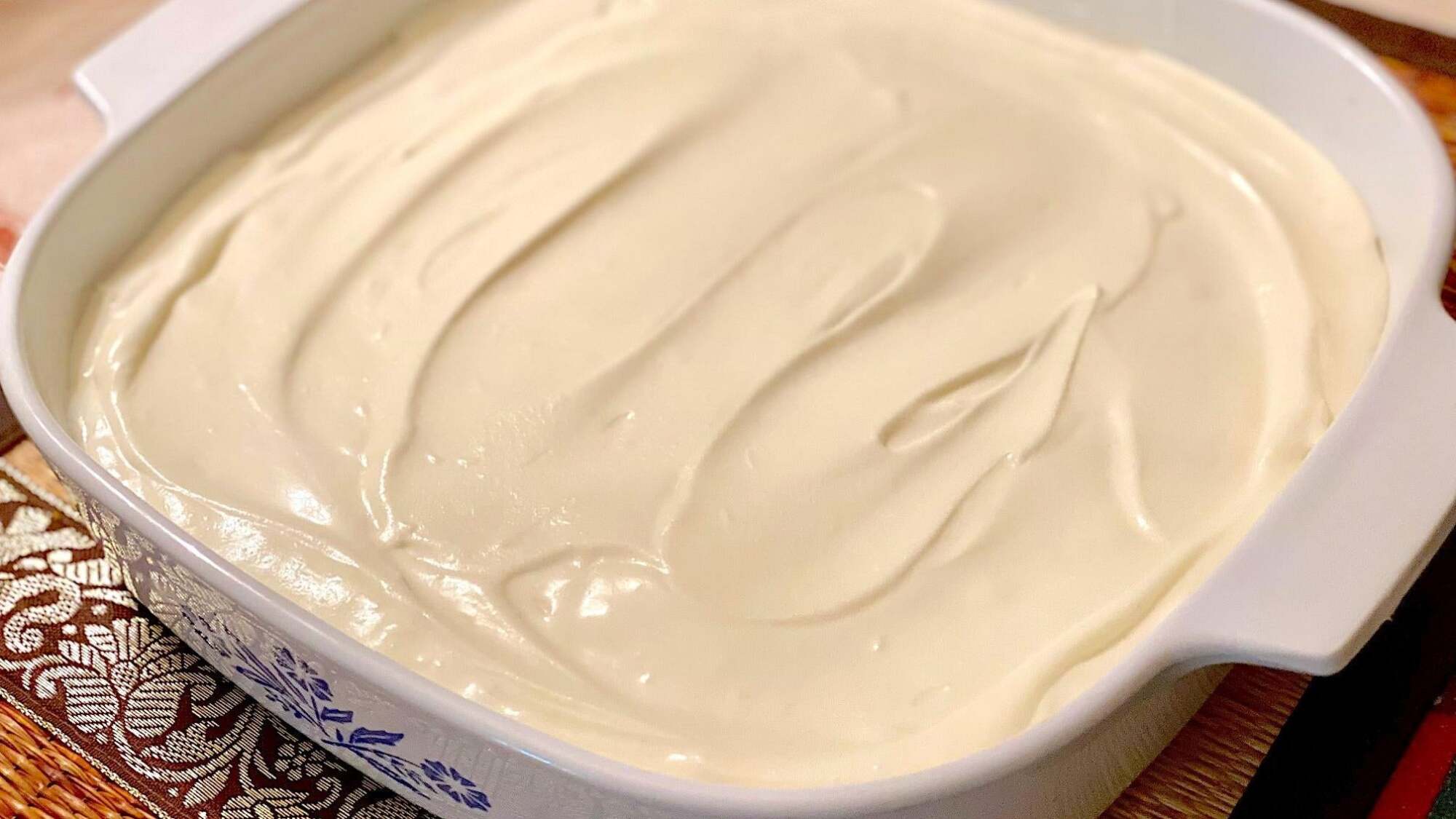 The finished no-bake cheesecake in a casserole dish.