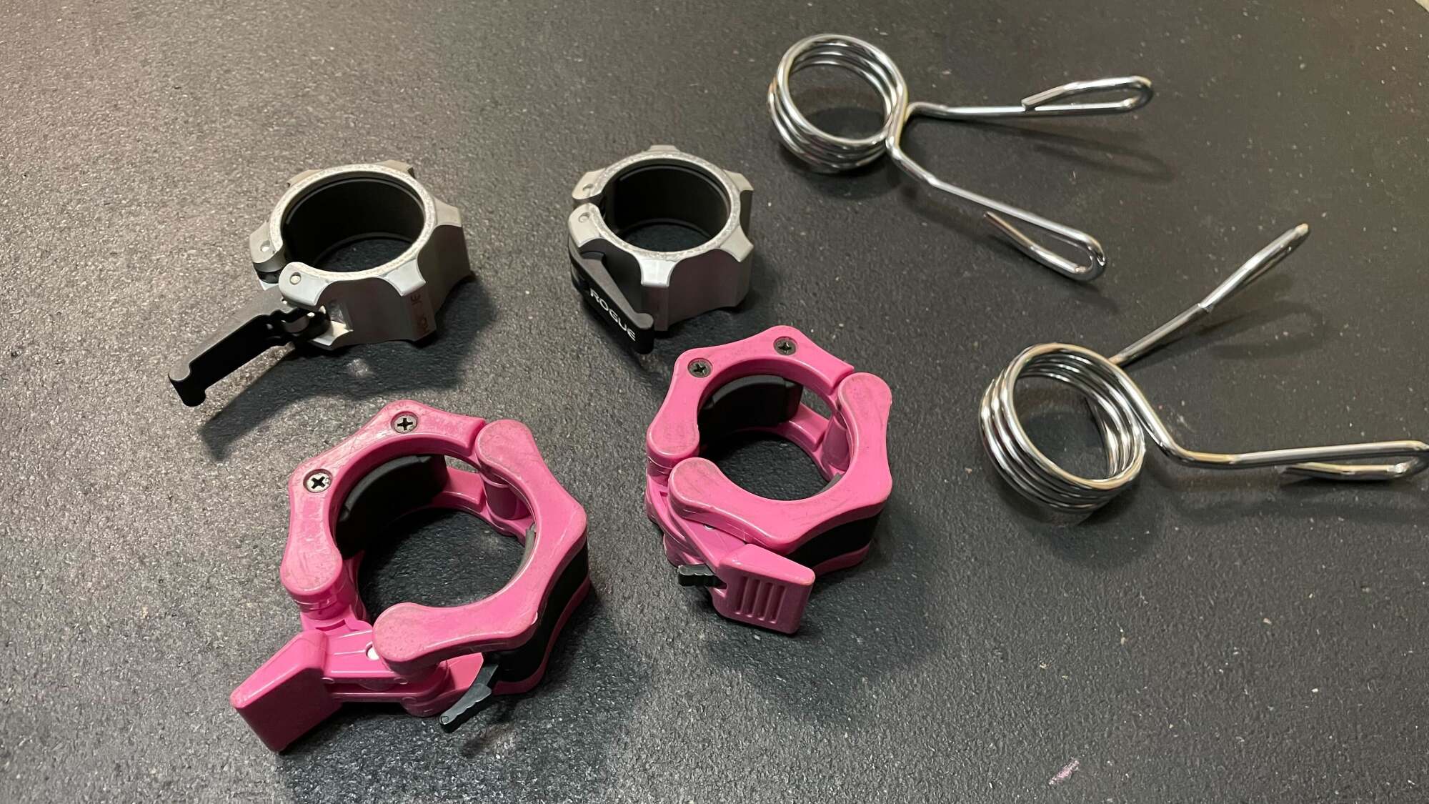 Three different types of barbell collars.