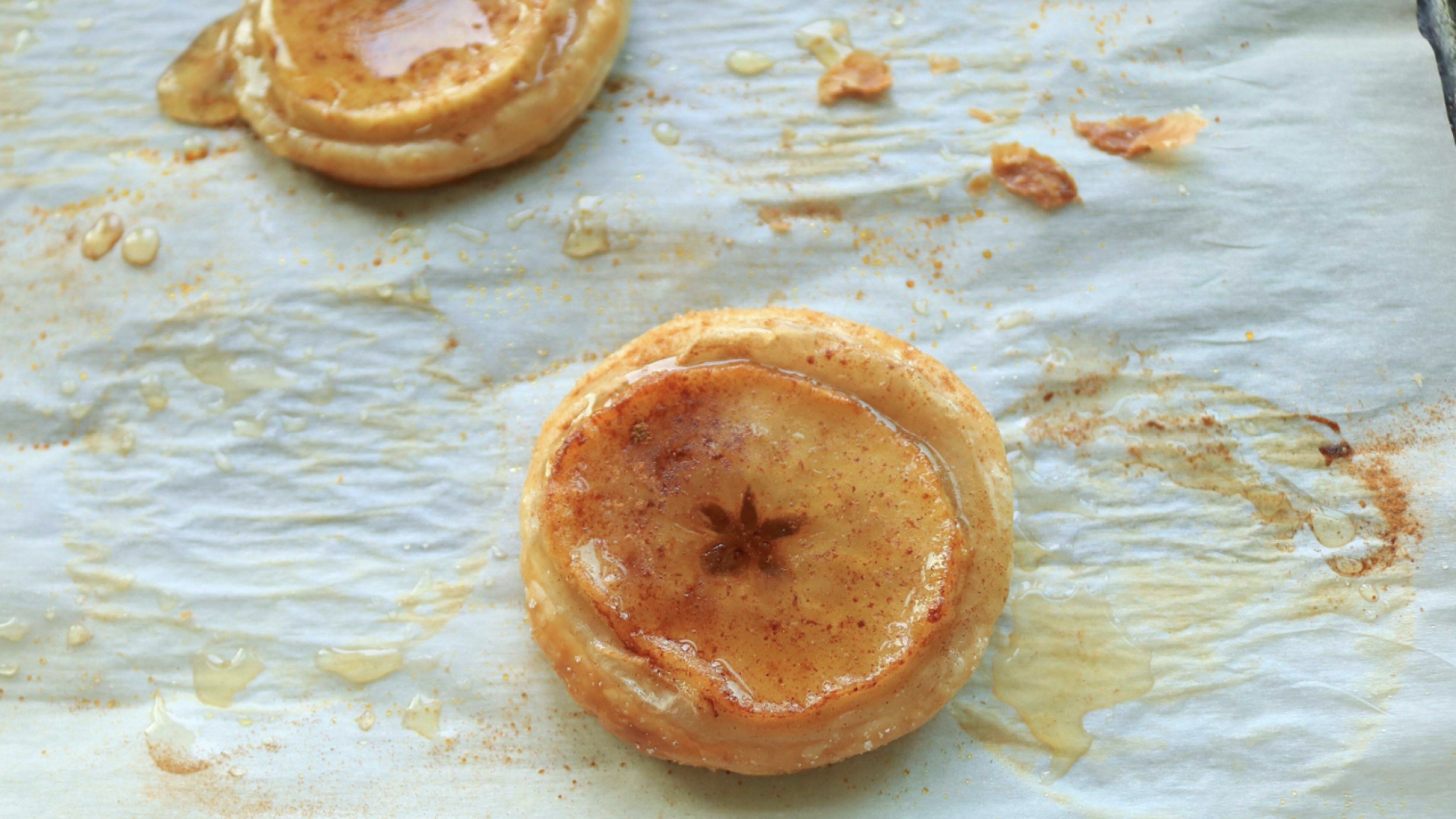 Single apple puff on a sheet tray.