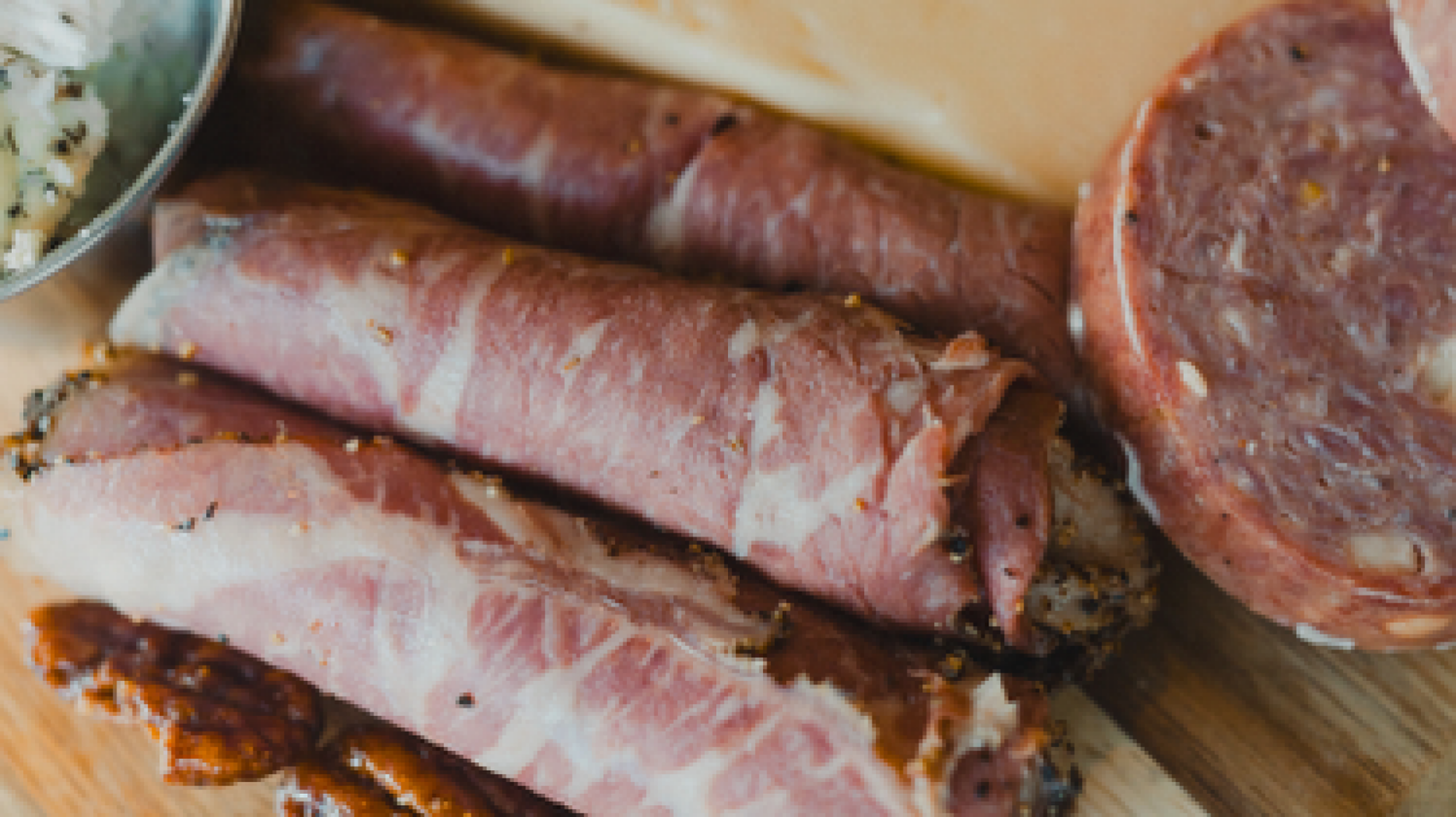 Beef on a charcuterie board.