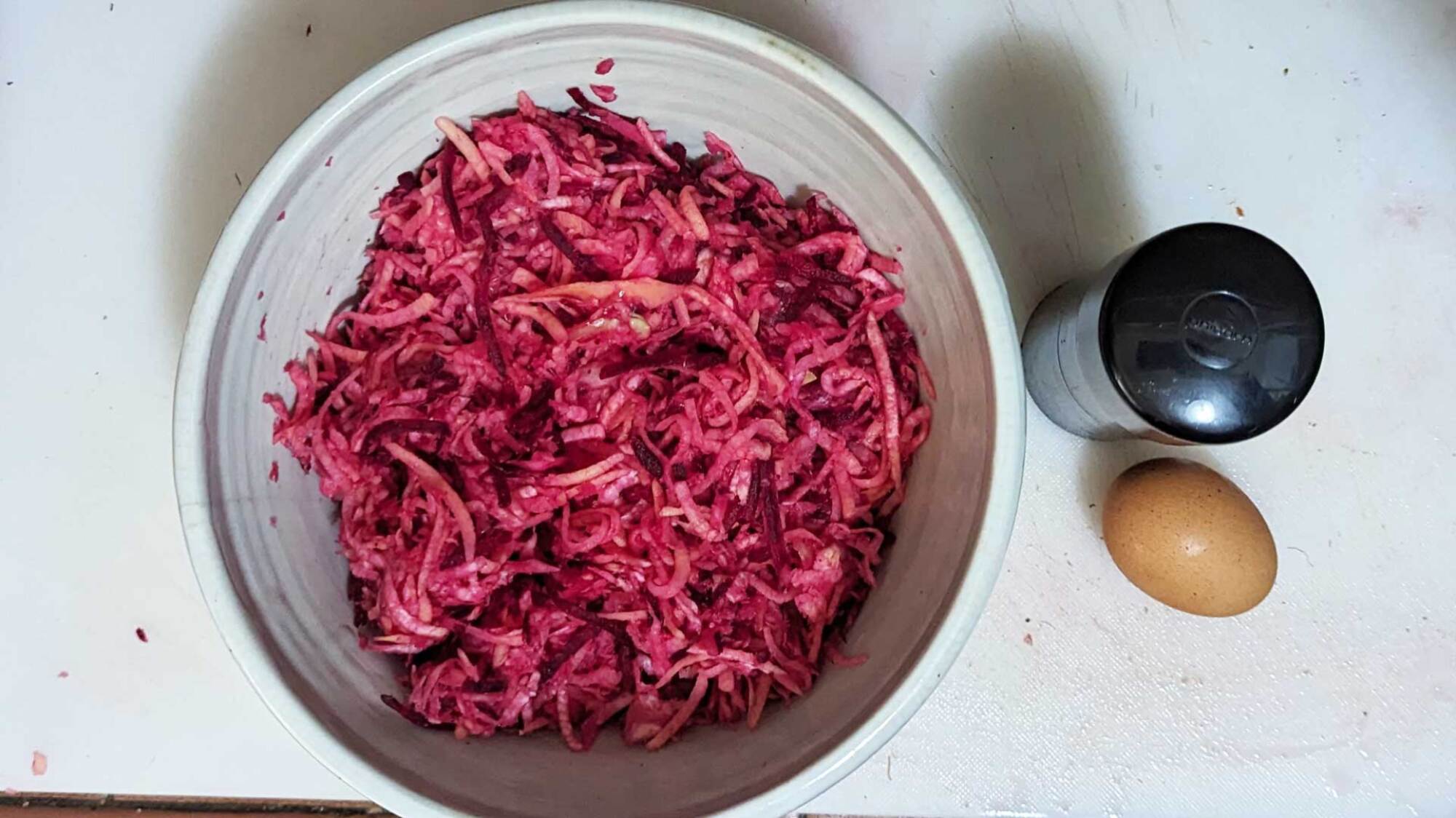 image of latke ingredients before adding egg