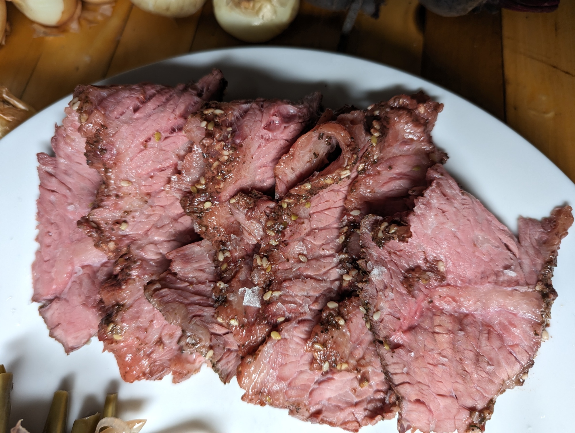 Sous vide brisket seasoned simply with flaky salt, served with grainy mustard, and pickled green beans and red onions