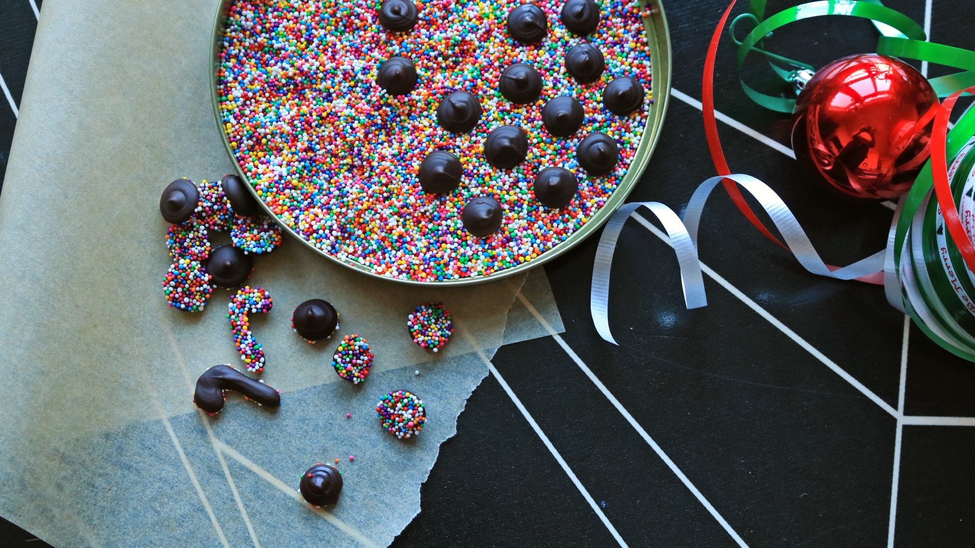 Nonpareils on a table with ribbons