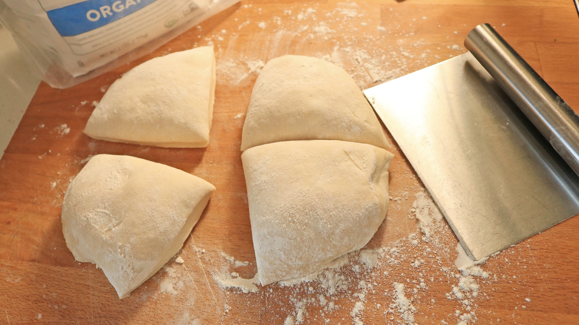 Dough cut into four quarters.