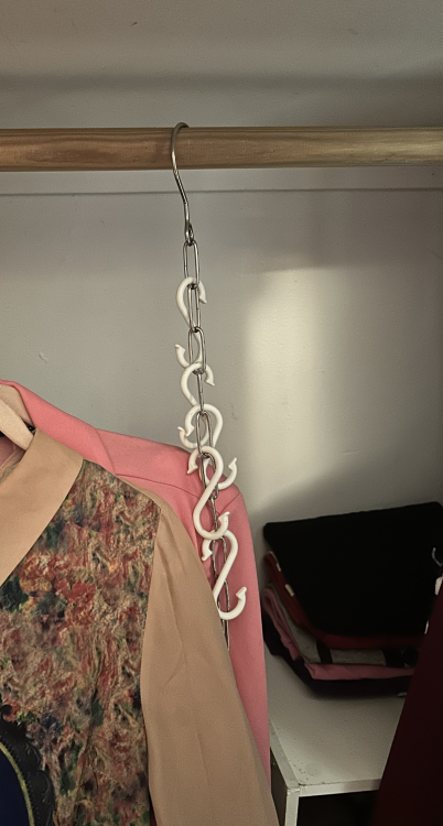 A chain hanging in a closet