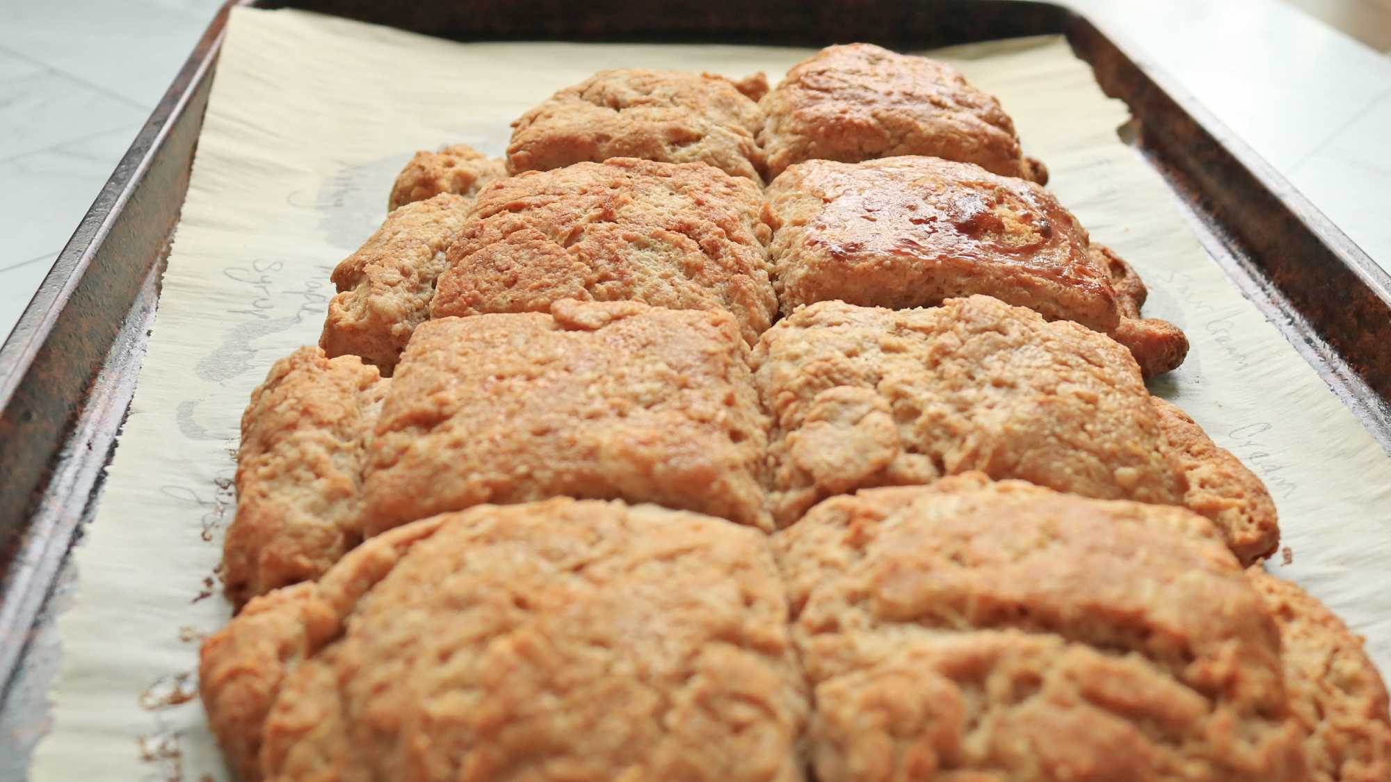 Biscuits on a sheet pan.