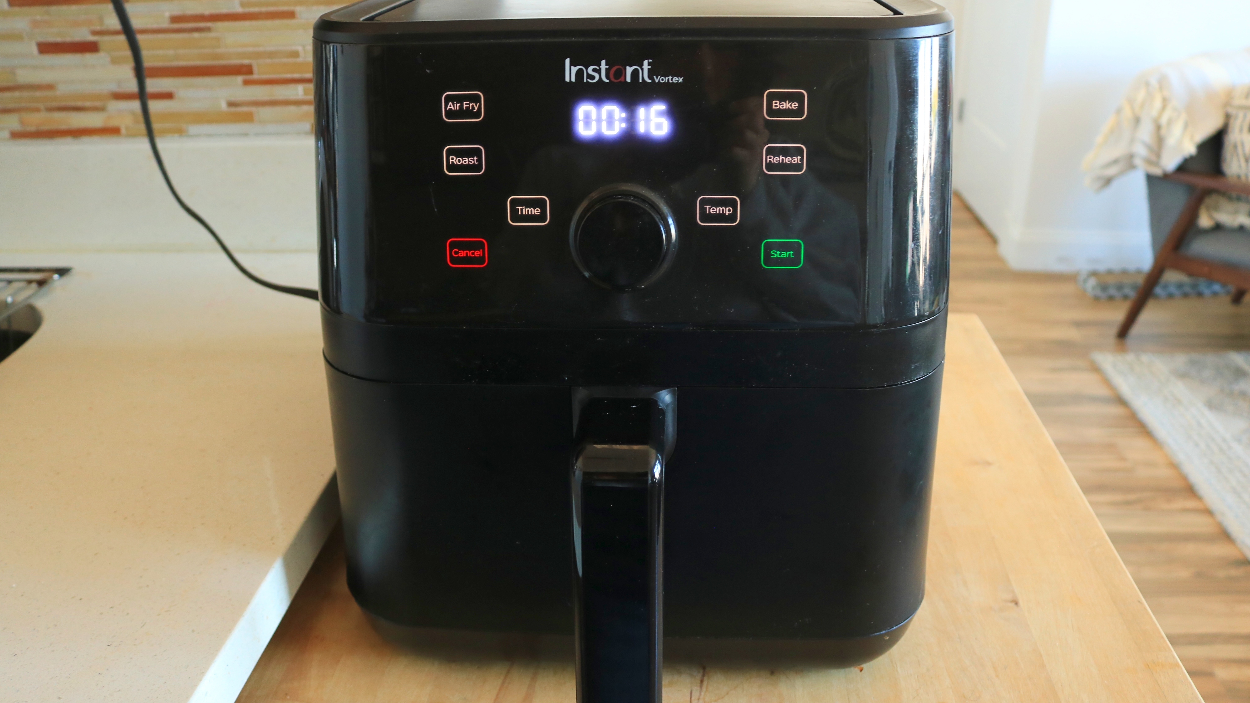 A Ninja air fryer on a countertop.