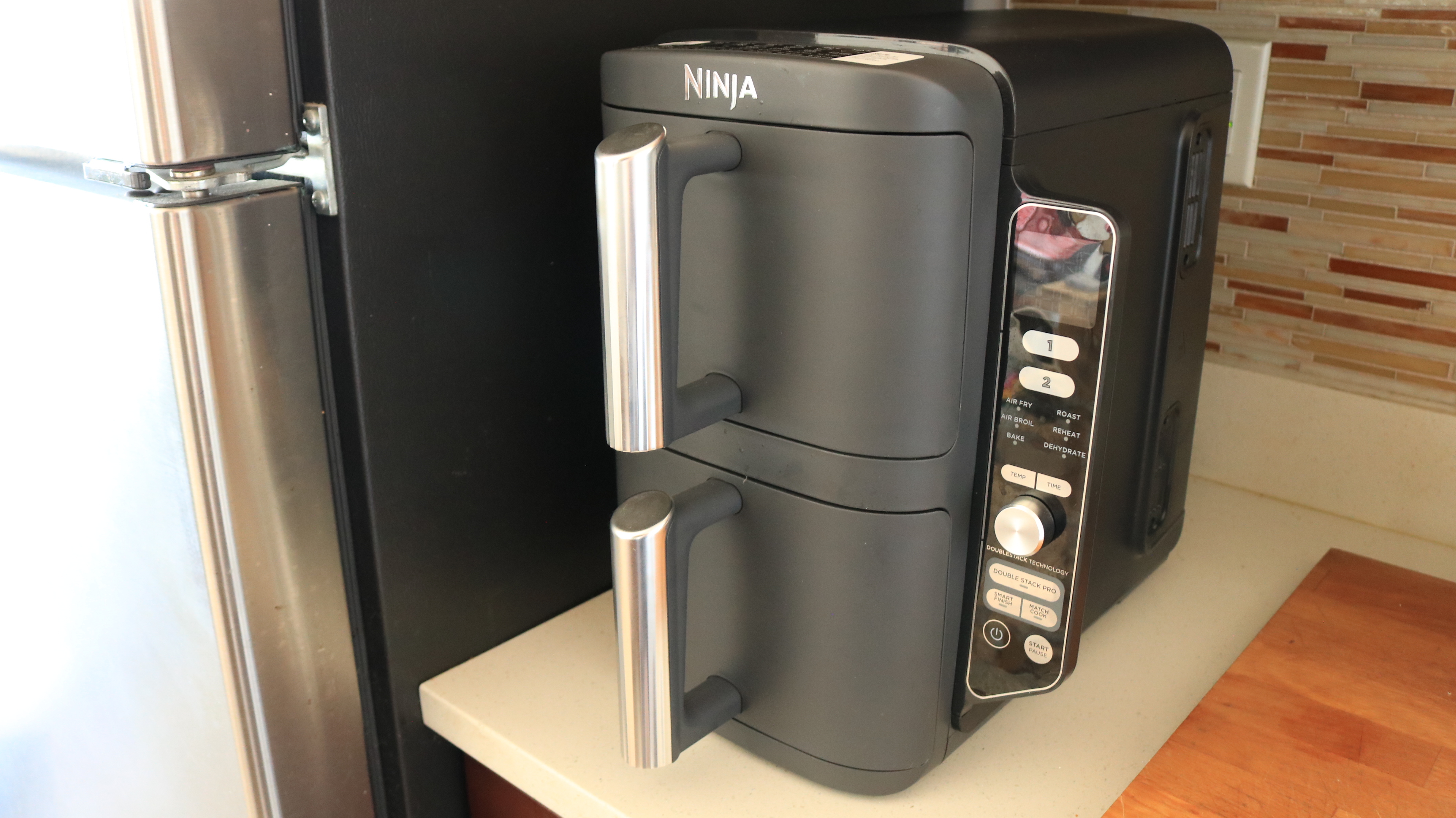 A Ninja DoubleStack air fryer on a countertop.