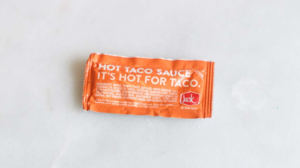 A Single Jack in the Box Taco Sauce Packet